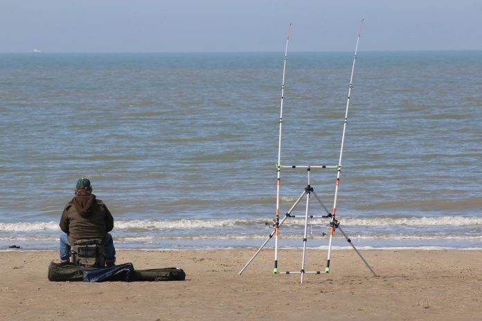 Angler am Cadzand-Bad-Strand